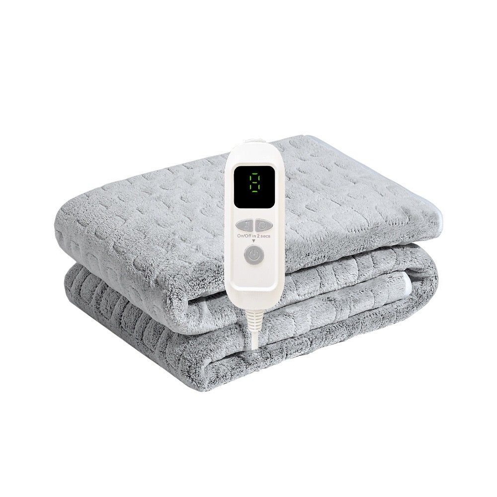 VärmeLindra™ – Elektrisk värmefilt